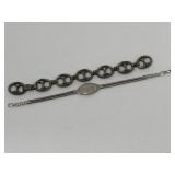 Pair of silver bracelets