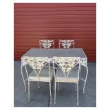 Vintage wrought iron patio table and chairs