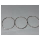 Group of three sterling silver bangle bracelets