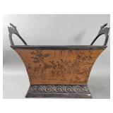 Asian-style metal cachepot with Chinese court