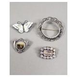 Sterling silver and silver brooches: antique