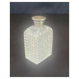 Vintage crystal perfume bottle with glass