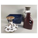 Three ceramic vases and one ceramic planter