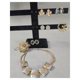 Group of vintage designer jewelry: earrings,