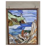 Framed coastal lighthouse stained glass panel