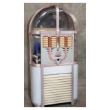 Vintage AMI model C jukebox with accessories and