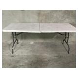 Plastic folding table