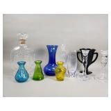 Group of glass decanter, vases and candlesticks