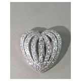 Sterling silver heart pendant adorned with