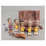 Five Los Angeles Lakers bobble heads, leather