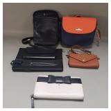 Group of handbags, wallets, etc.