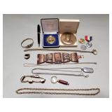 Group of costume jewelry, mechanical pencil,