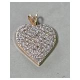 14k gold and diamond heart form pendant