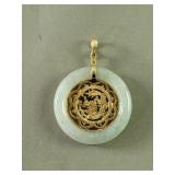 14k gold and jade pendant