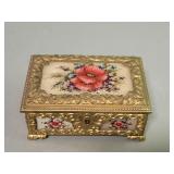 Vintage brass and glass jewelry box with hand