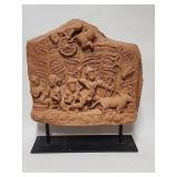 Vintage terracotta sculpture on metal stand