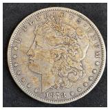 1878 Morgan silver dollar coin.