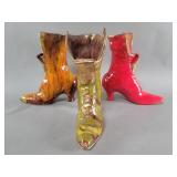 Three Victorian style ceramic boot form vases