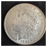 1921 Morgan silver dollar coin.