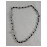 Silver necklace with interlinked blue enamel