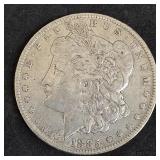 1885-O Morgan silver dollar coin.