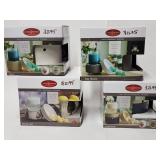 4 deluxe Candle Warmers in original boxes