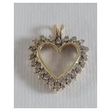 14k gold and diamond heart shape pendant
