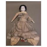 Antique porcelain and fabric doll