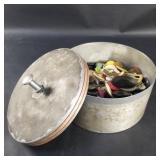 Canister of vintage and antique buttons