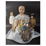 Group of vintage dolls and figurines