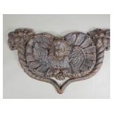 Vintage cast iron cherub plaque