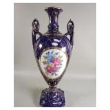 Blue floral porcelain urn by Baum Bros