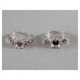 Pair of 14k white gold rings