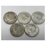 5 Kennedy half-dollar coins