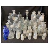Large lot of antique apothecary bottles