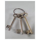 Three vintage brass skeleton keys