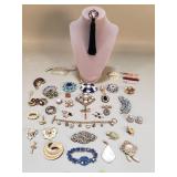 Group of vintage costume jewelry, pendants,