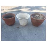Three terracotta planters