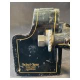 Antique metal cloth-stripping machine with wood