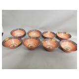 Eight Vintage hand painted terracotta bowls