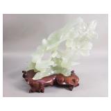 Chinese carved pale green serpentine sculpture