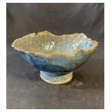 Signed glazed pottery bowl