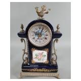 Ceramic and spelter battery operated cherub clock