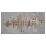 Contemporary Mid-century modern-style metal wall