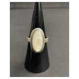 Sterling silver ring with white iridescent oval