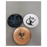 Three Mid-century enameled saucers