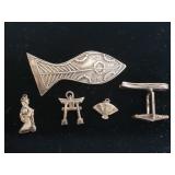 Group of sterling silver pendants, cufflink, and