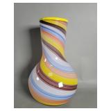 Hand blown art glass vase featuring a