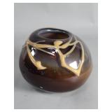 Hand blown glass round vase depicting abstract