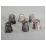 Six sterling silver thimbles